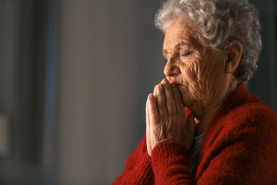 Old woman praying